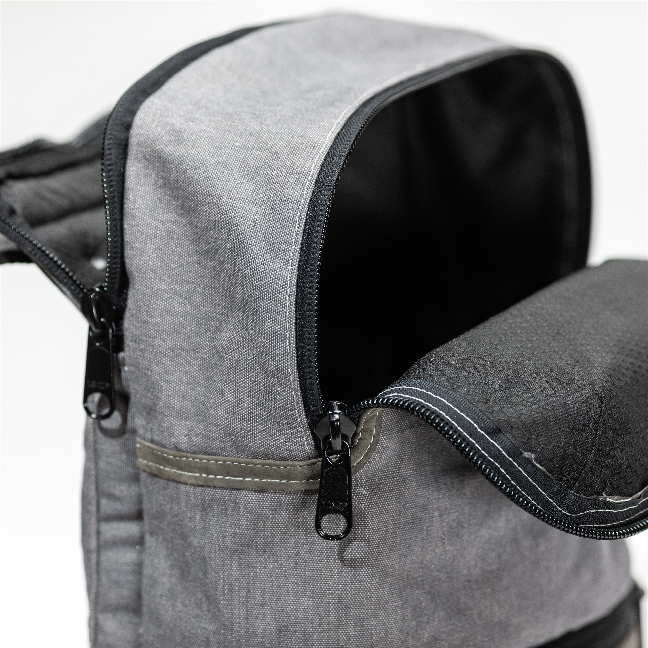Everyday backpack opened to show spacious interior compartments and padded laptop sleeve