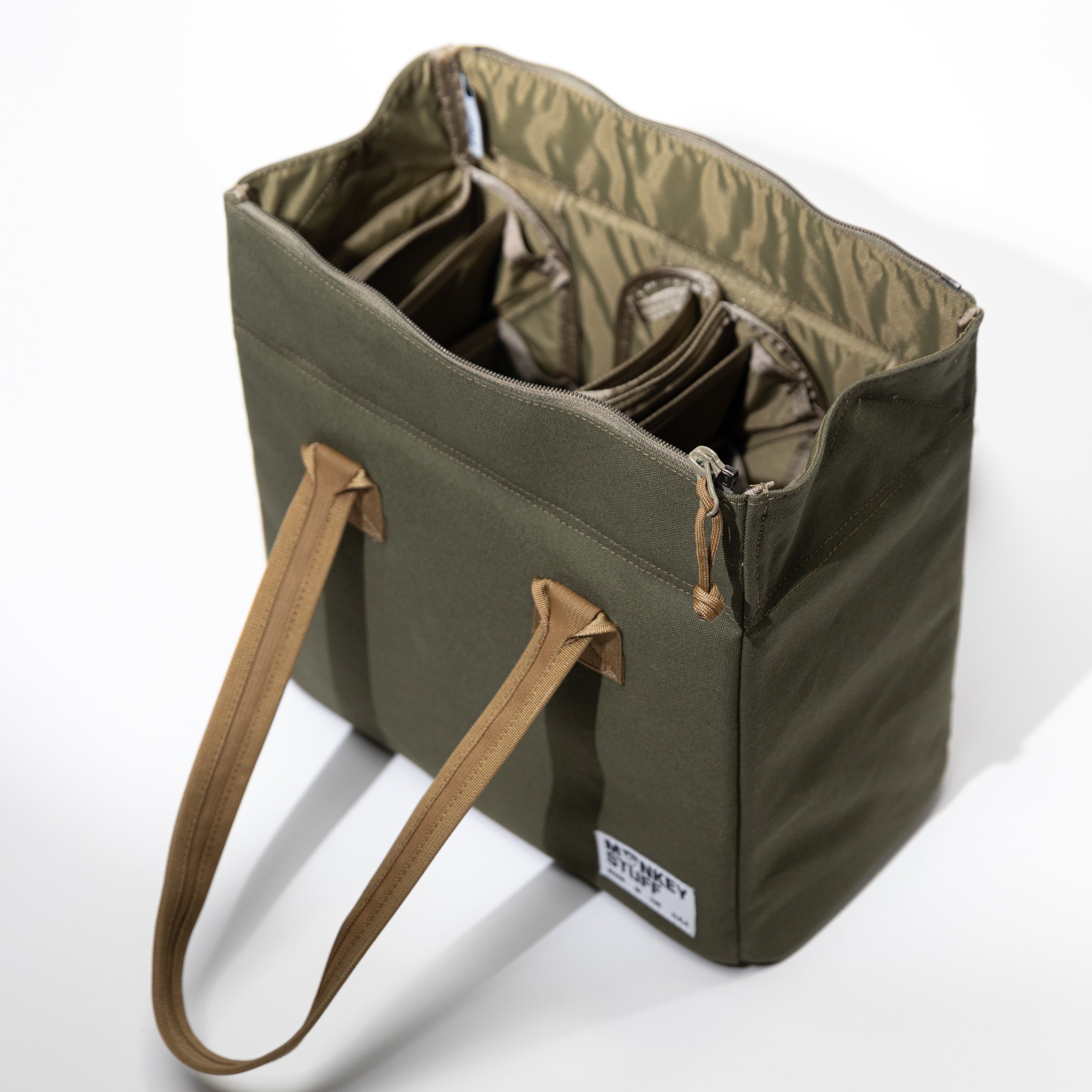 Monkey Stuff bowl bag — padded carrier designed to safely transport ceramic bowls and pottery