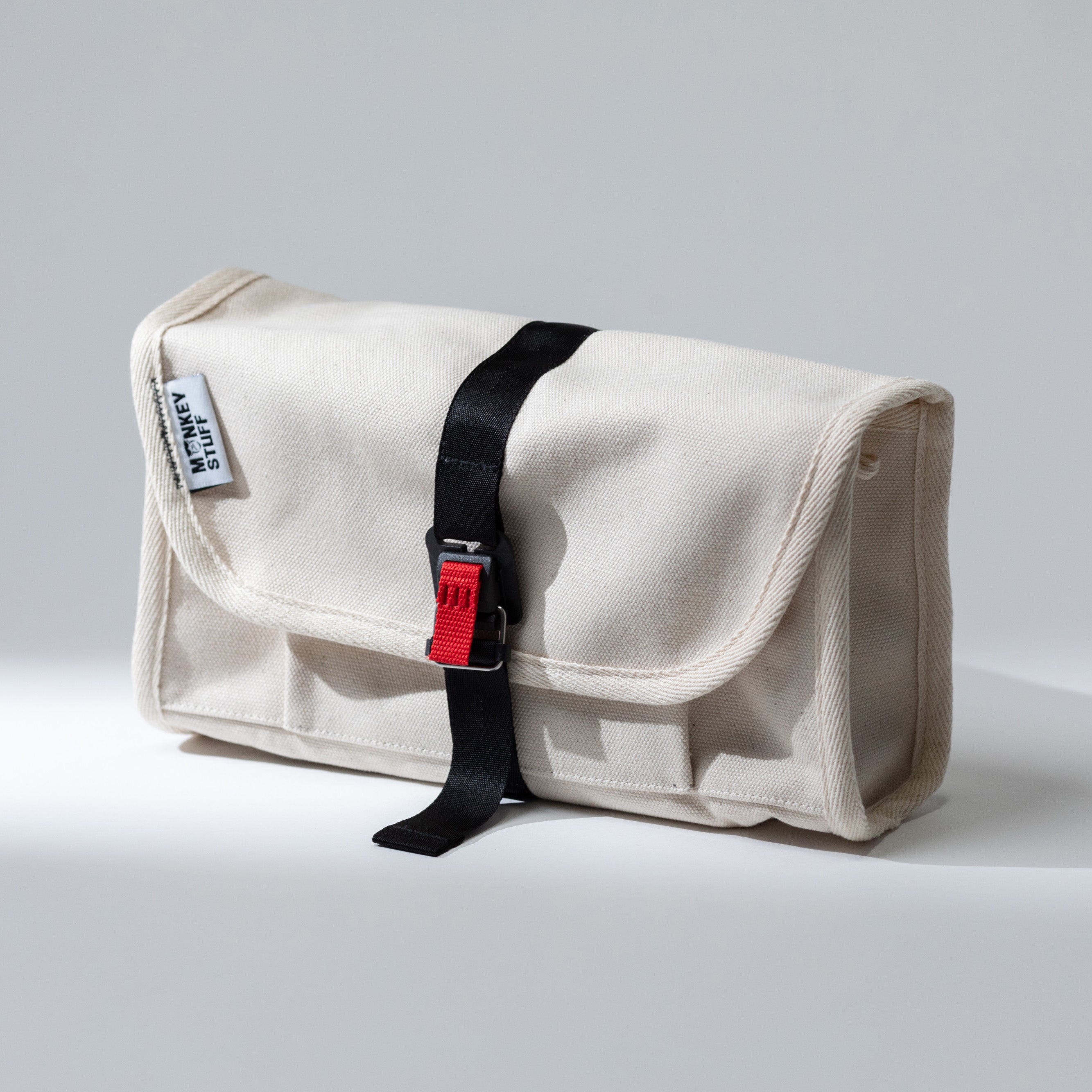 Monkey Stuff tech pouch — compact recycled canvas organizer