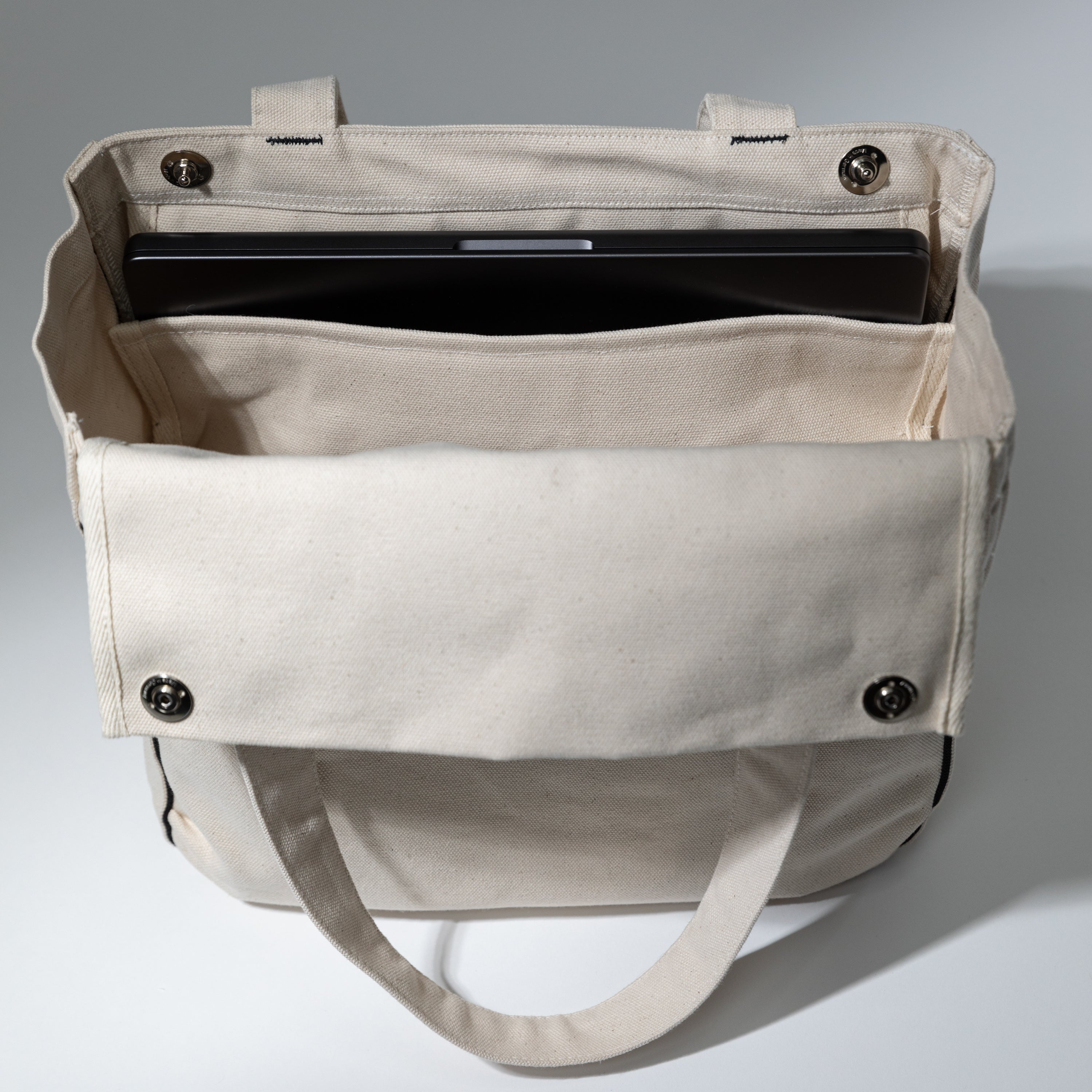 Medium tool bag opened showing compartments 