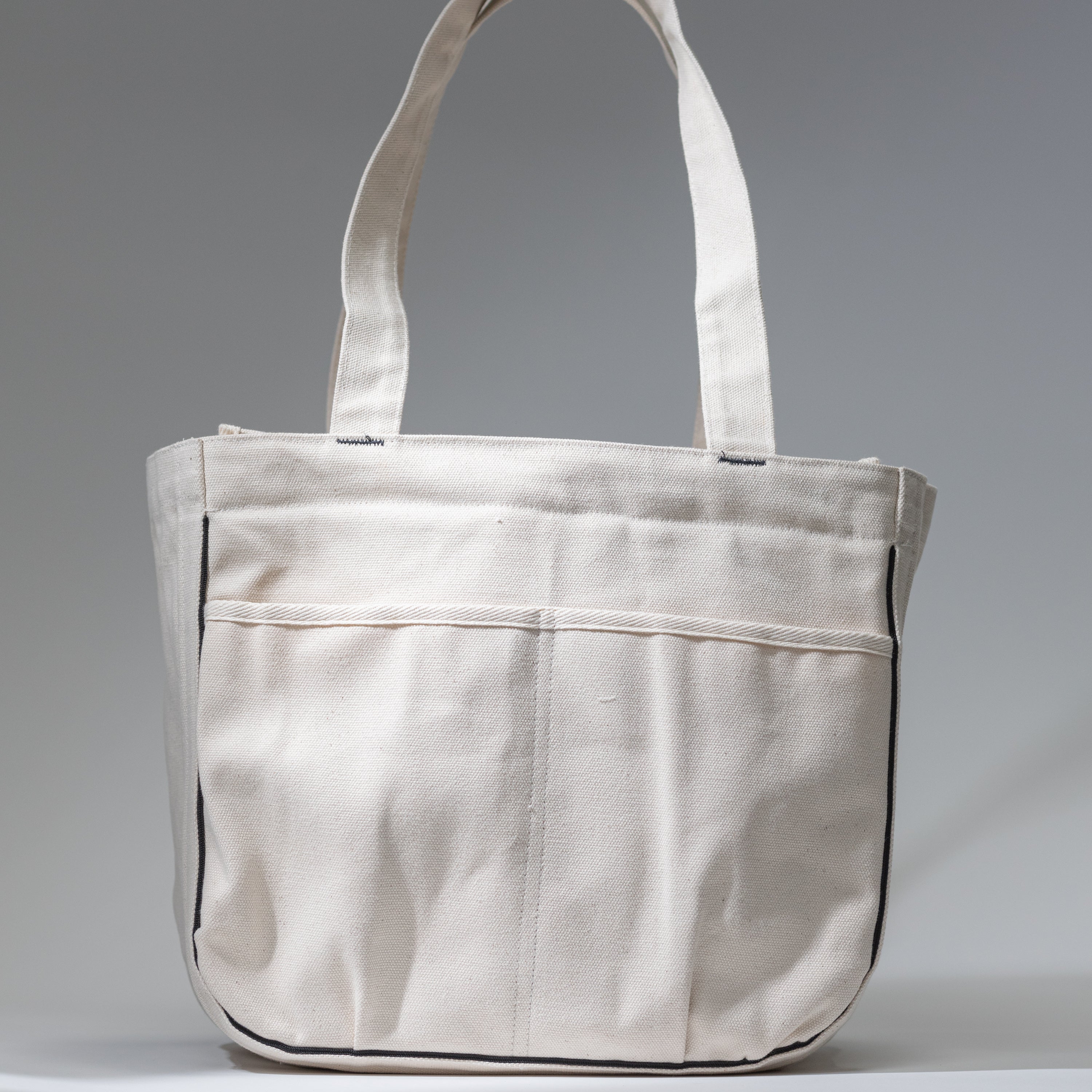 Monkey Stuff medium pottery tool bag — compact recycled canvas with organized compartments