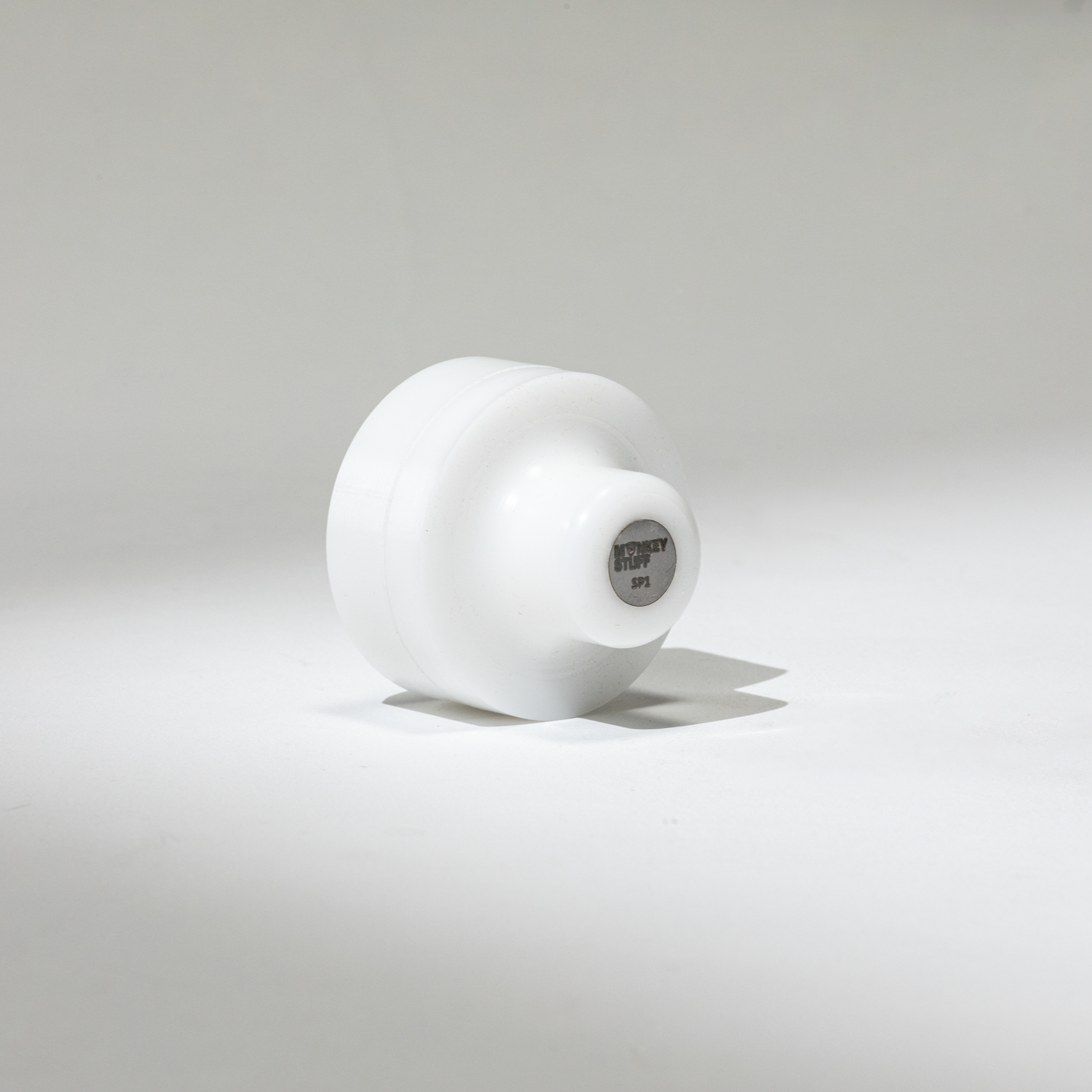 Monkey Stuff TS1 Trimming Spinner — Delrin polymer body with ergonomic grip and R8 ball bearing